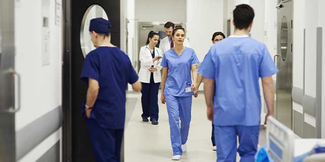 doctors walking through hallway